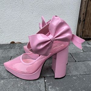 Pink clear heels with bows